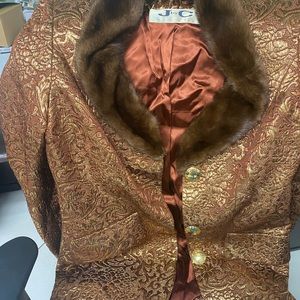 Beautiful J by C made in Italy with mink collar.